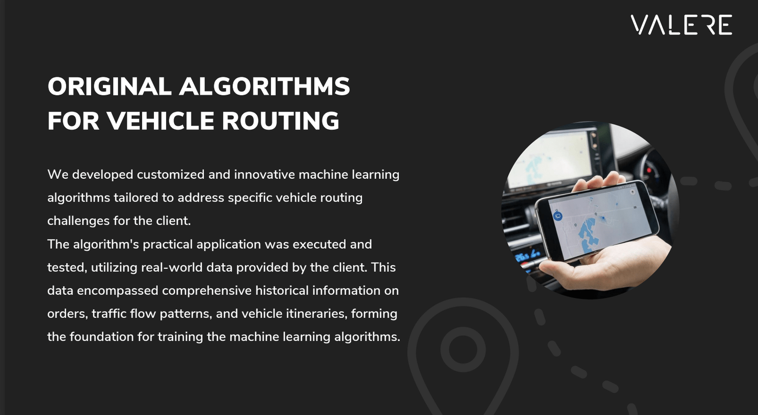 A hand holds a mobile device displaying a dynamic vehicle routing application, exemplifying Valere's innovation in machine learning for transportation.